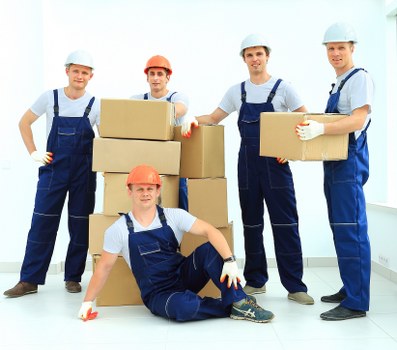 Office furniture and equipment being prepared for a Surbiton business move