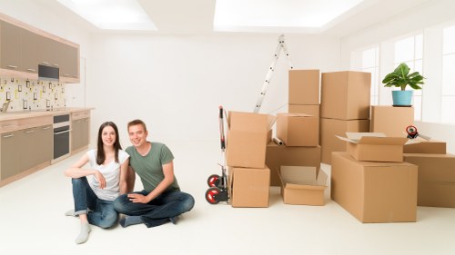 Packed office items organised for a commercial removal in Surbiton