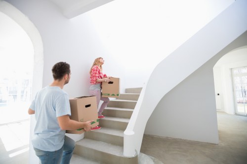 Furniture and boxes being transported by a local removal team