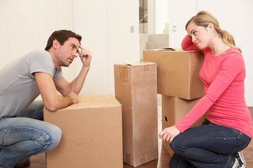 Prepared moving boxes and furniture ready for collection in Surbiton