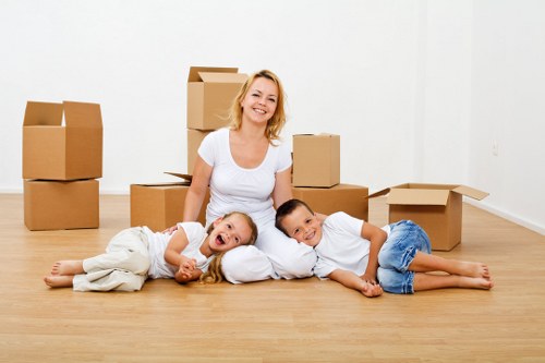 Moving boxes and household items in a Surbiton residential street