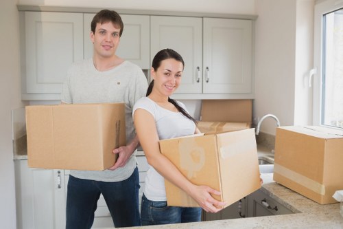 Packed boxes and furniture ready for a household removals service